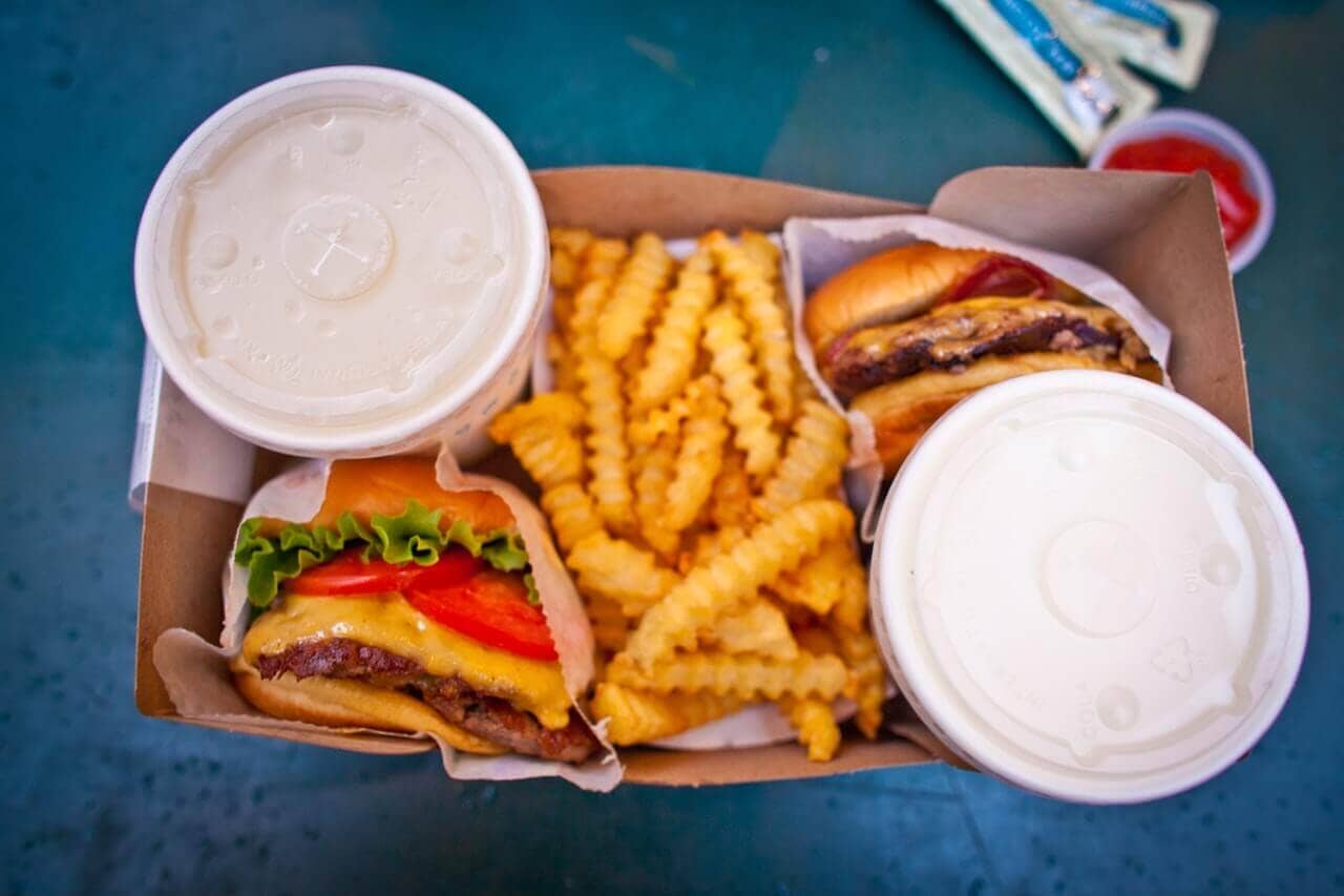 Learn how to avoid empty calories, like those in the fast food meal pictured.